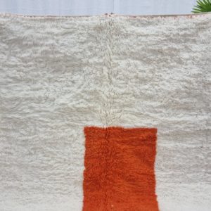 White And Orange Rug