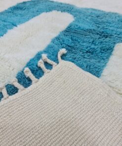 White and blue rug