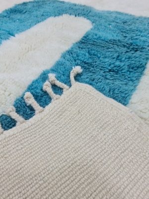White and blue rug