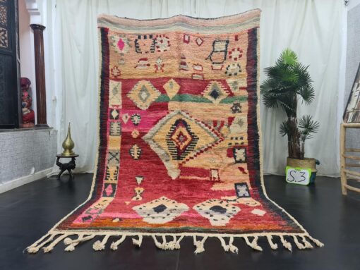 Red And Faded Orange Rug