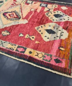 Red And Faded Orange Rug