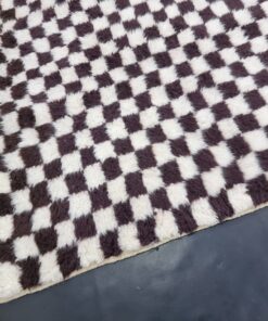 Dark Brown and White Rug