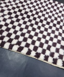 Dark Brown and White Rug