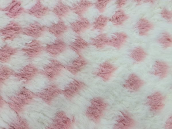 Faded Pink And White Rug
