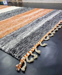 Orange And Black Striped Rug