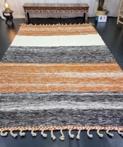 Orange And Black Striped Rug