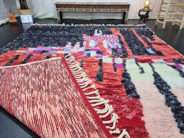 Faded Red and Black Rug