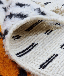 orange and white rug