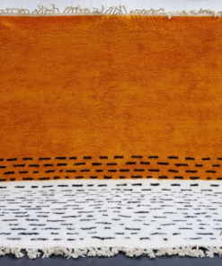 orange and white rug