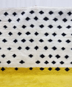 yellow and white rug