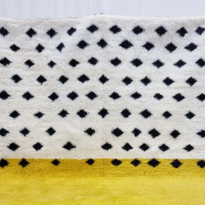 yellow and white rug