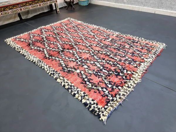 faded red and white rug