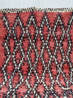 faded red and white rug