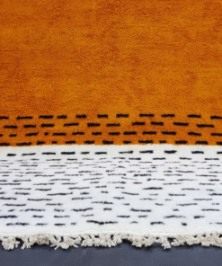 orange and white rug