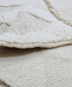 off white and beige rug