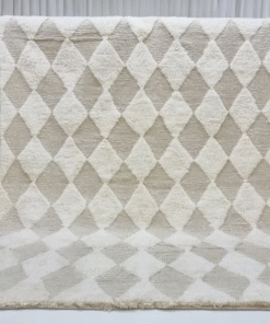 off white and beige rug