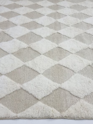 off white and beige rug