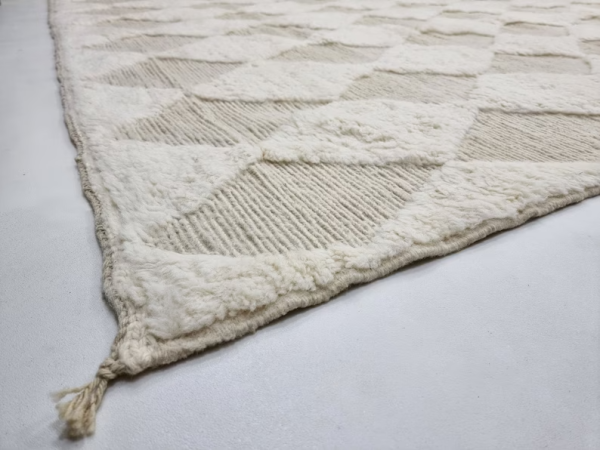 off white and beige rug