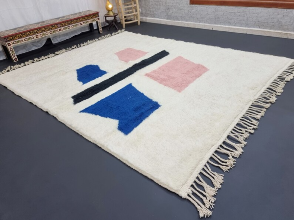 white and pink rug