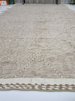 Long Beige and White Rug