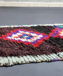 Unique Black and Red Vintage Rug