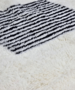 white and black rug
