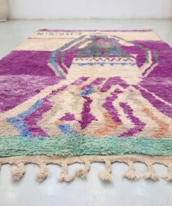 purple and off white rug