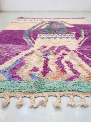 purple and off white rug